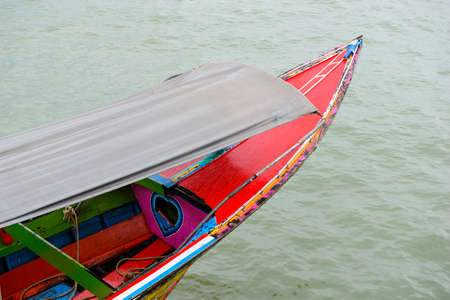 Long tail wooden thai boatの写真素材