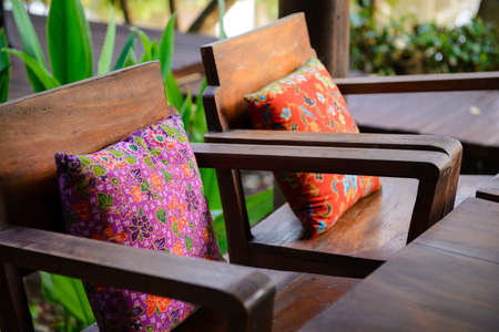 Pillow on wood chairの写真素材