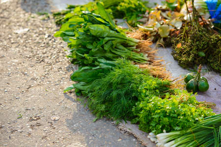 Vegetables for sale on roadside in Laos marketplaceの写真素材
