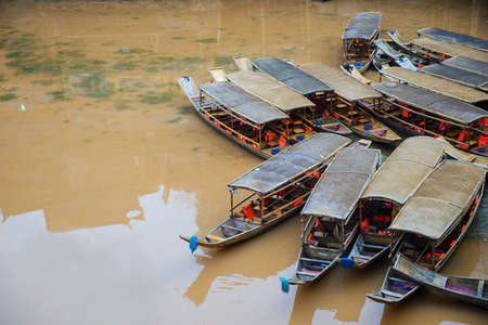 Wooden boat at Fenghuang ancient town, Hunan Province, Chinaの写真素材