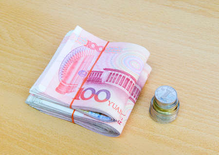 RMB Chinese with coin on the tableの写真素材