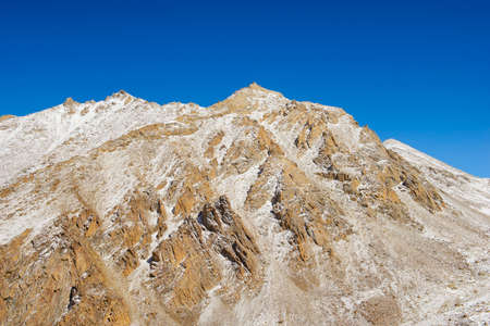 Snowy mountain peakの写真素材