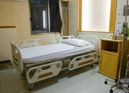 Empty hospital room with bedsの写真素材