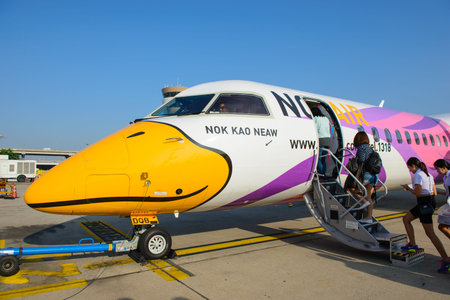 Bangkok, Thailand - November 26, 2014 : Unidentified people walked to BOMBARDIER Q400 NextGen Nok...