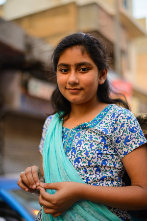 New Delhi, India - April 10, 2016 : Indian street girl smiling. April 10, 2016 in Paharganj Delhi, Indiaのeditorial素材