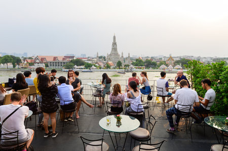 Bangkok, Thailand - September 29, 2019 : Unidentified traveler enjoying at top view bar and restaurant by the temple of dawn or Wat Arunのeditorial素材