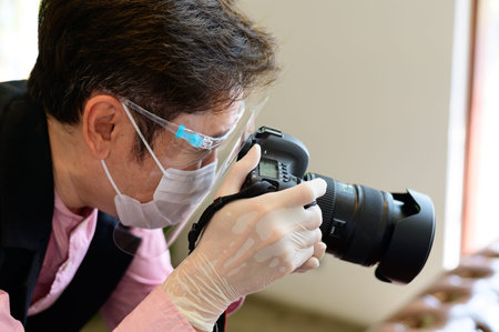 Photographer at work during   pandemic