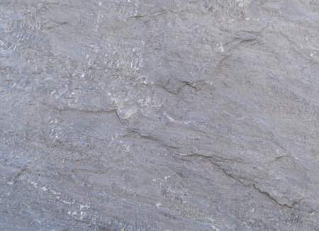 Gray rough stone texture backgroundの写真素材