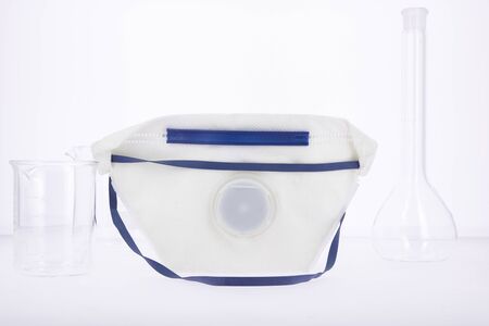 mask for infectious diseases with laboratory test tubes, prevention objectsの写真素材