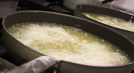 detail of a pan with hot oil cookingの写真素材