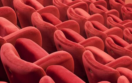 Red armchairs of a theatre in fabric.の写真素材