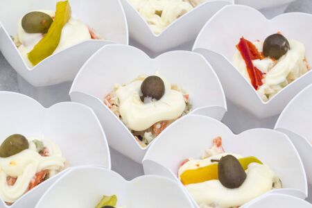 Elegant dishes with Maionnaise salad ready to be eaten.の写真素材