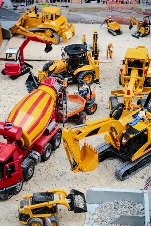 The building yard in toy version, there are the crane and crawlers workの写真素材