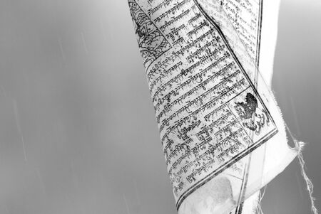 Ancient flag typical of Indian travel in the peaks of Annapurnaの写真素材