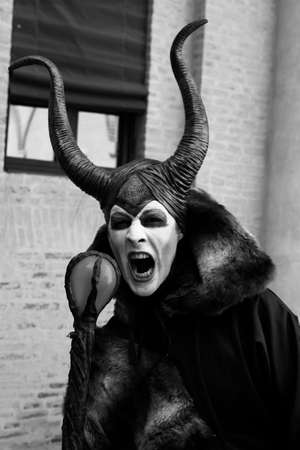Ferrara, Italy, 19/06/2017: Funny cosplay cryng dressed as evil monster, photographed during a carnivalのeditorial素材