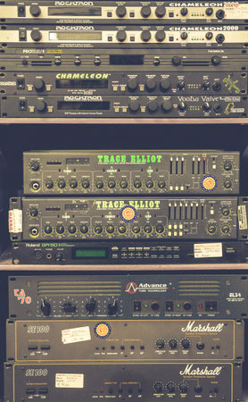 Roreto di Cherasco (Cn), Italy, 03.12.2017: In an engraving room there are old amplifiers used to...