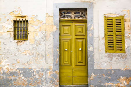 Old door of a typical Maltese Houseの写真素材
