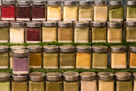 Jars of spices for cooking photographed frontally