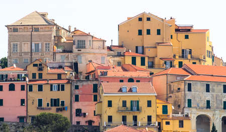 Front view of ancient Ligurian houses in the city of Imperia in Porto Maurizio.の写真素材