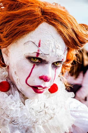 Lucca, Italy, 03/11/2018: Cosplayer disguised as a scary clown during the manifestation of the Lucca Comix 2018のeditorial素材