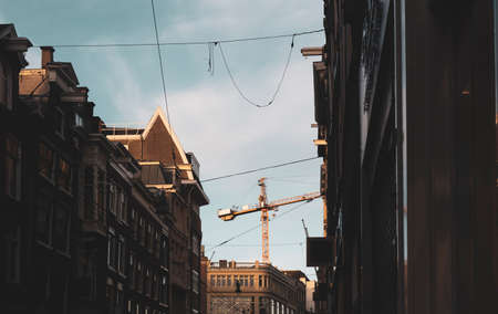 Amsterdam urban landscape with crane used for building constructionの写真素材