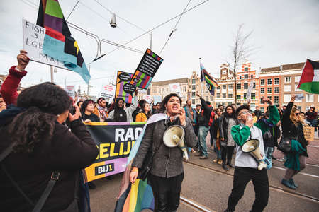 Amsterdam, Holland, 23/03/2019: People demonstrating during an anti racist procession in the city center of Amsterdamのeditorial素材