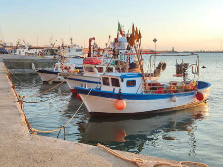 Ligurian boat moored in the port of Imperia Onegliaの写真素材