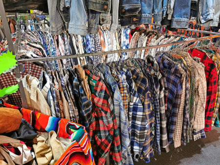 vintage dresses and shirts for sale in the used clothing storeの写真素材