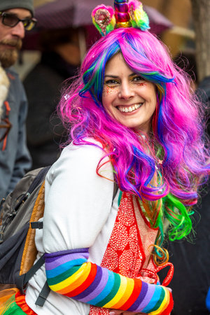 smiling lady wearing a unicorn costumeのeditorial素材