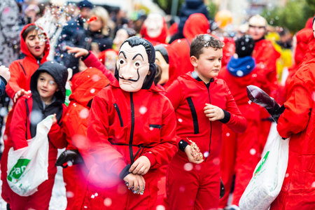 kids wearing masks of The Paper House characters.のeditorial素材