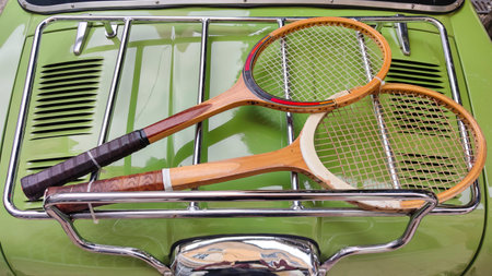 Vintage Tennis Rackets on Classic Car Bonnet Retro Sports Gear Display