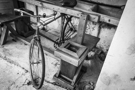Vintage 1970s Bicycle in Abandoned Warehouseの写真素材