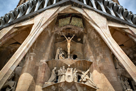 Sagrada Familia Crucifixion Facade Low Angle Architectural Viewの写真素材