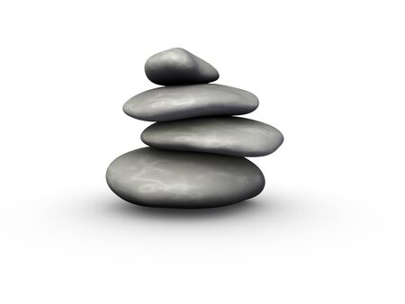 An isolated balanced stone tower on white backgroundの写真素材