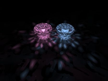 A sparkling pink and blue brilliant cut diamonds on dark backgroundの写真素材