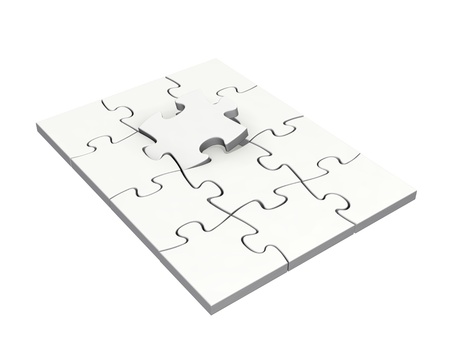 Completing jigsaw puzzle with last piece isolated on white backgroundの写真素材