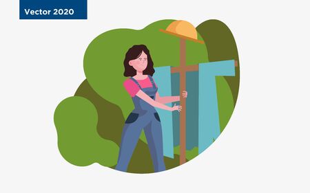 Female farmer setting scarecrow. Woman, farmer, field flat illustration. Gardening, farming, agriculture concept for banner, website design or landing web pageの写真素材