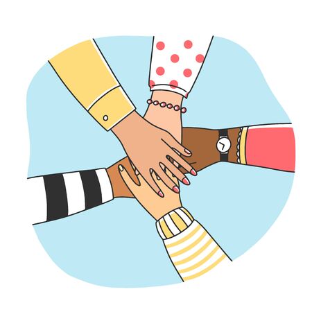 Diverse women putting their arms togetherの写真素材