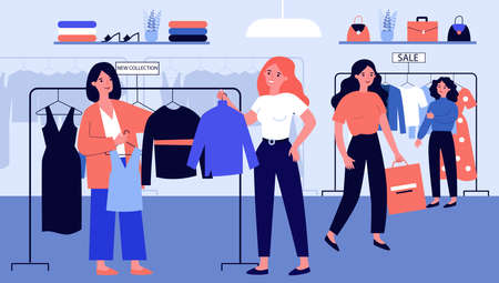 Girls at modern fashion store choosing clothes on hangerの写真素材