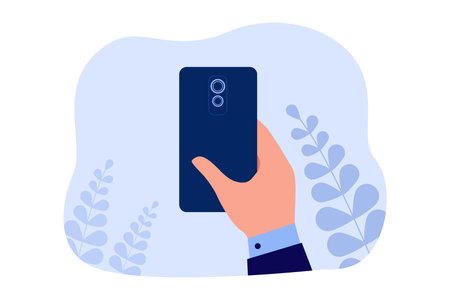 Human hand holding back side of mobile phone with rear camera. Backside view of male office workers arm using smartphone app flat vector illustration. Cellular communication, technology conceptのイラスト素材