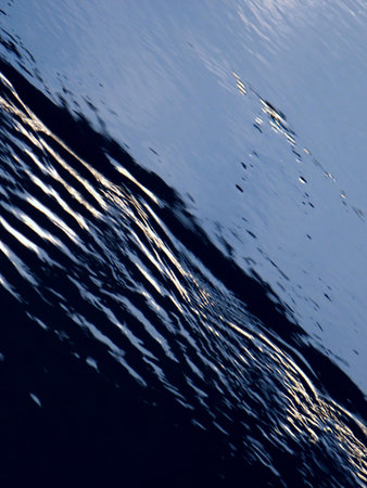 Blue creek with ripples - abstract background