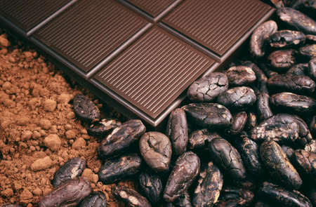 Bar of chocolate, cocoa beans , cocoa powderの写真素材