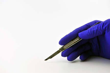 Surgical blades and gloveの写真素材