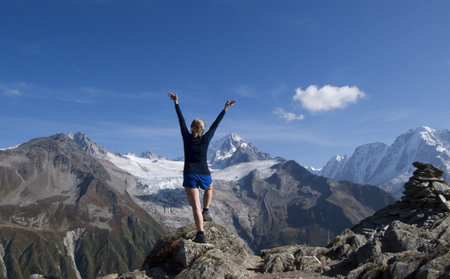 A euphoric hiker in the European Alps