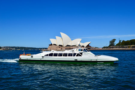 A ferry with Sydney Opera House in the backgroundのeditorial素材