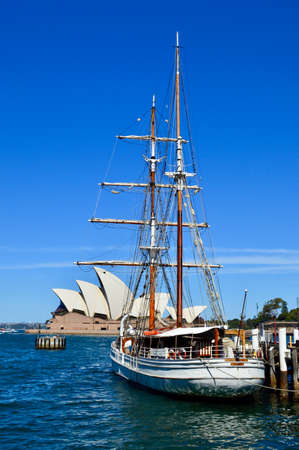 A tall ship moored in Sydney Harbor at Circular Quayのeditorial素材