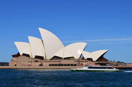 The Rivercat drifts past the Sydney Opera House in Australiaのeditorial素材