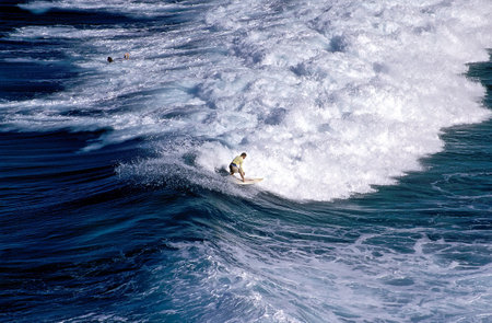 Surfer on Blue Ocean Wave, Stradbroke Island, Australiaの写真素材