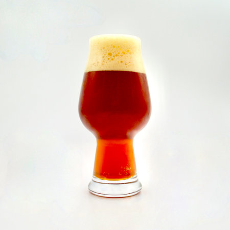 A pint of red IPA beer isolated on a white background with copy space.の写真素材