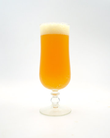 A glass of beer on a white background with space for text.の写真素材